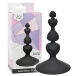 Elegancki czarny korek analny Sweetheart Plug z silikonowym wykończeniem, zaprezentowany obok stylow