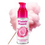 Olejek do masażu Plaisir Sucré o aromacie waty cukrowej na tle puszystej chmury różowego cukru.