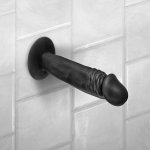 Elastyczne i miękkie czarne dildo Real Zack wyginane w dłoniach dla pokazania realistycznej struktur