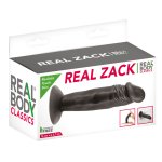 Czarne dildo Real Zack przymocowane do płytek łazienkowych za pomocą przyssawki dla wygody użytkowan