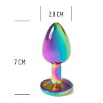 Tęczowy korek analny z podanymi wymiarami: 7 cm długości i 2,8 cm średnicy.